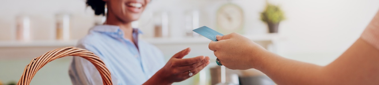 Woman making a transaction with a card